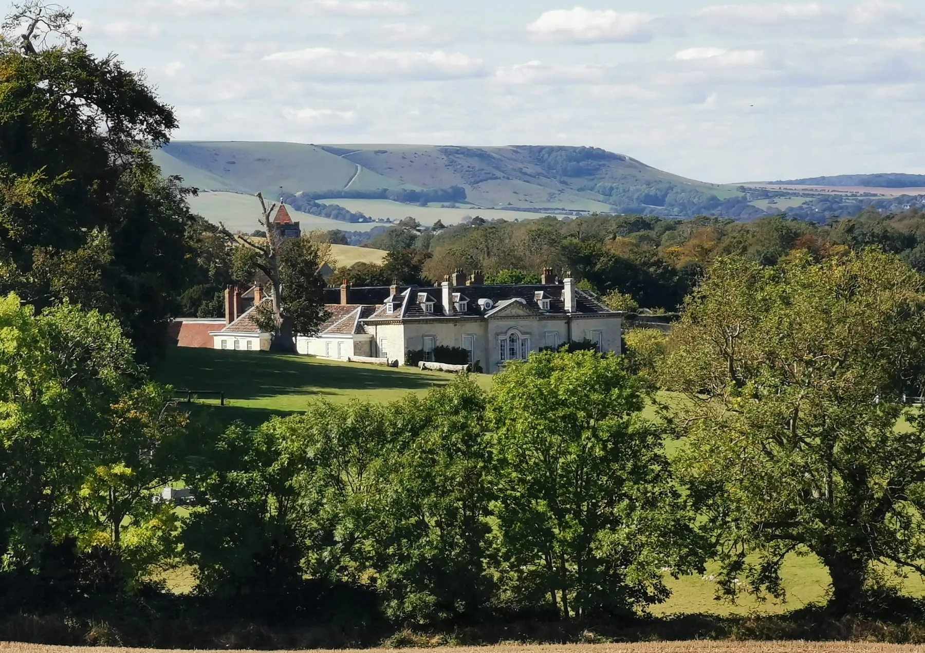Firle Place in its park below the South Downs